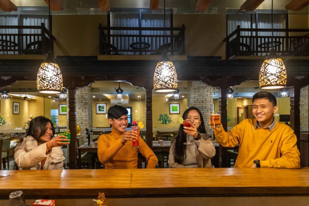 Bar Peepal Resort Pokhara Bagian luar foto A restaurant in Vietnam