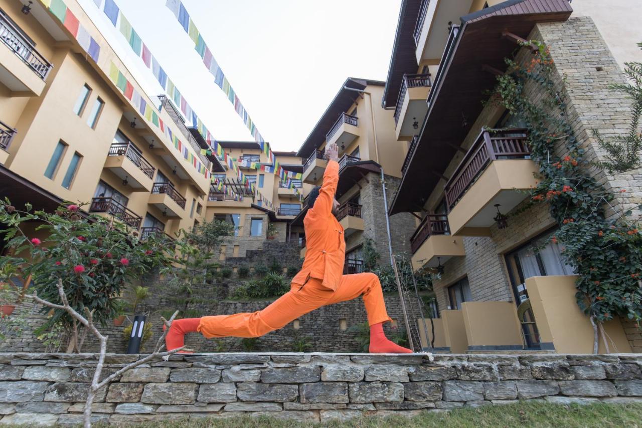 Bar Peepal Resort Pokhara Bagian luar foto A student of the Drepung Loseling Nunnery, practicing yoga.