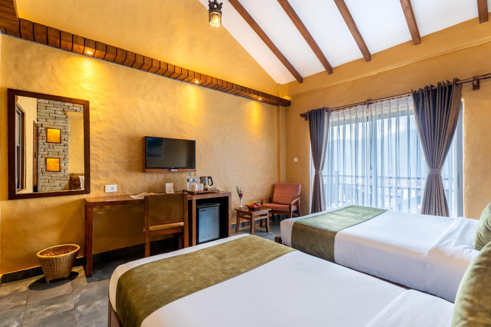 Bar Peepal Resort Pokhara Bagian luar foto Deluxe Room